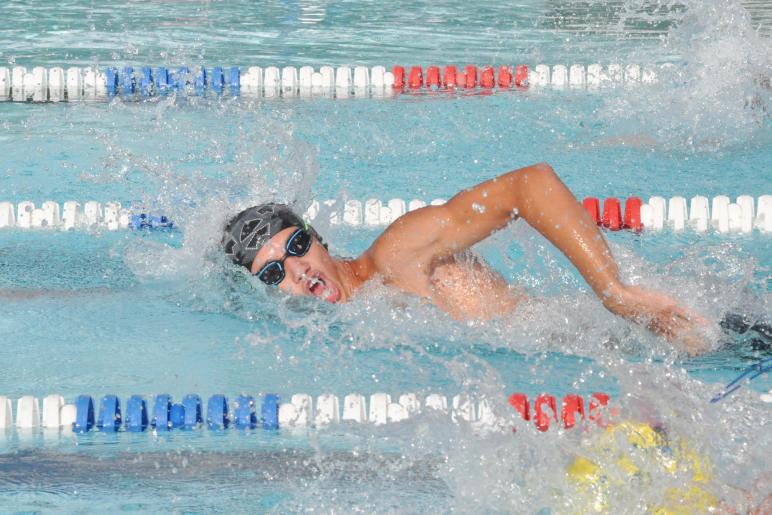Kaden Truman won three races for Ada vs. Westside Wednesday night in the 13-14 age group at the Ada pool. Here he swims the freestyle.