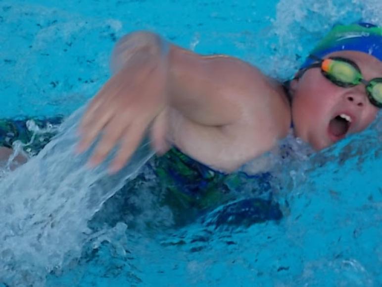 Alligator Mallorie Nelson won the 100 meter freestyle vs. Sherwood Thursday.