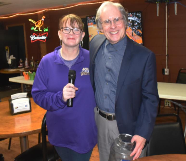 Meri Skilliter and John Neville - in charge of 50/50 tickets