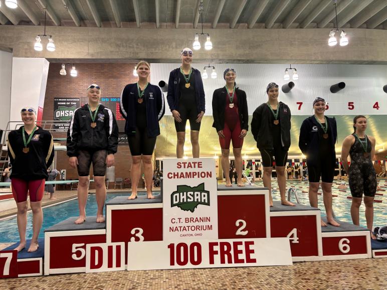 Baumgartner on the girls 100 backstroke podium, 7th place / PHOTO Ashley Robey